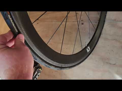 Can you ride home on a flat tire on a road bike with carbon wheels?