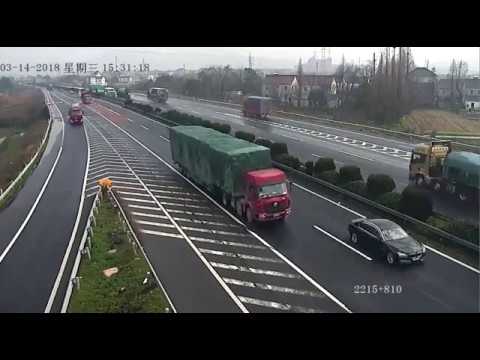 Reckless Driver Missed Exit Causes Two Semi Trucks to Crash Spectacularly