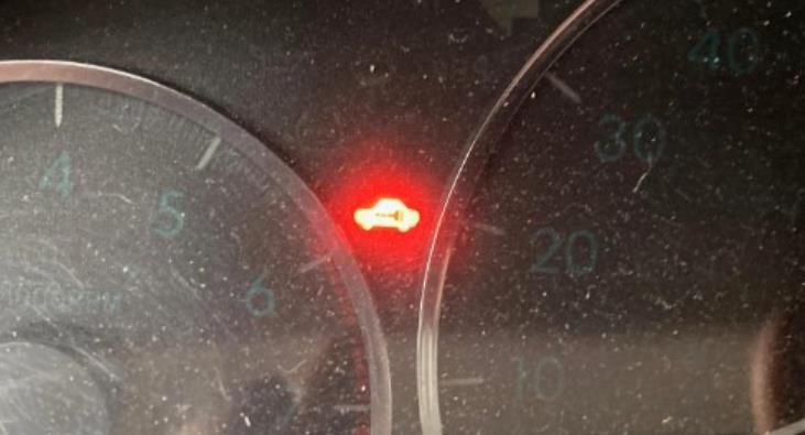 Why The Red Car With Key Symbol On Dashboard Comes On