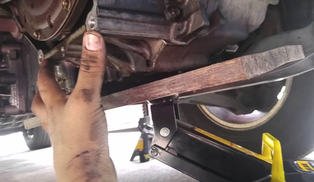 How Do You Remove Buildup From An Oil Pan